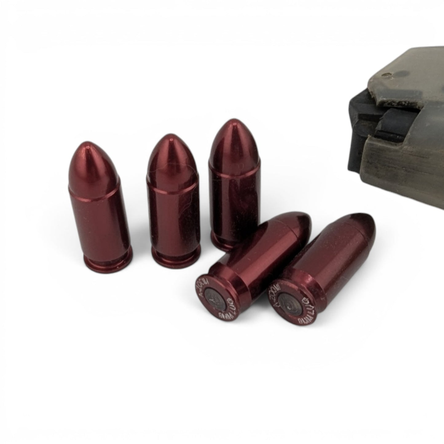 Adversary Force A-Zoom 9mm Luger aluminum snap caps in a 5-pack for safe dry fire training and function testing.