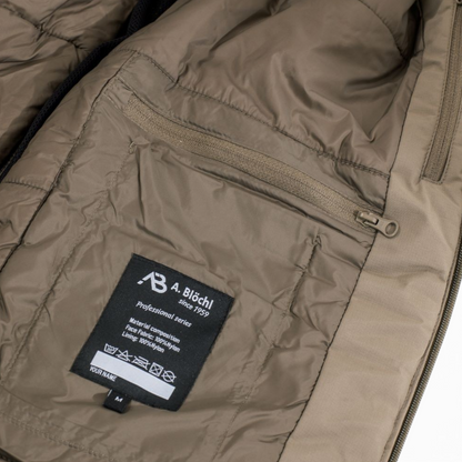 Adversary Force AB Jacket ECW Level 7 interior view showing the branded label, nylon lining, and zippered pocket.