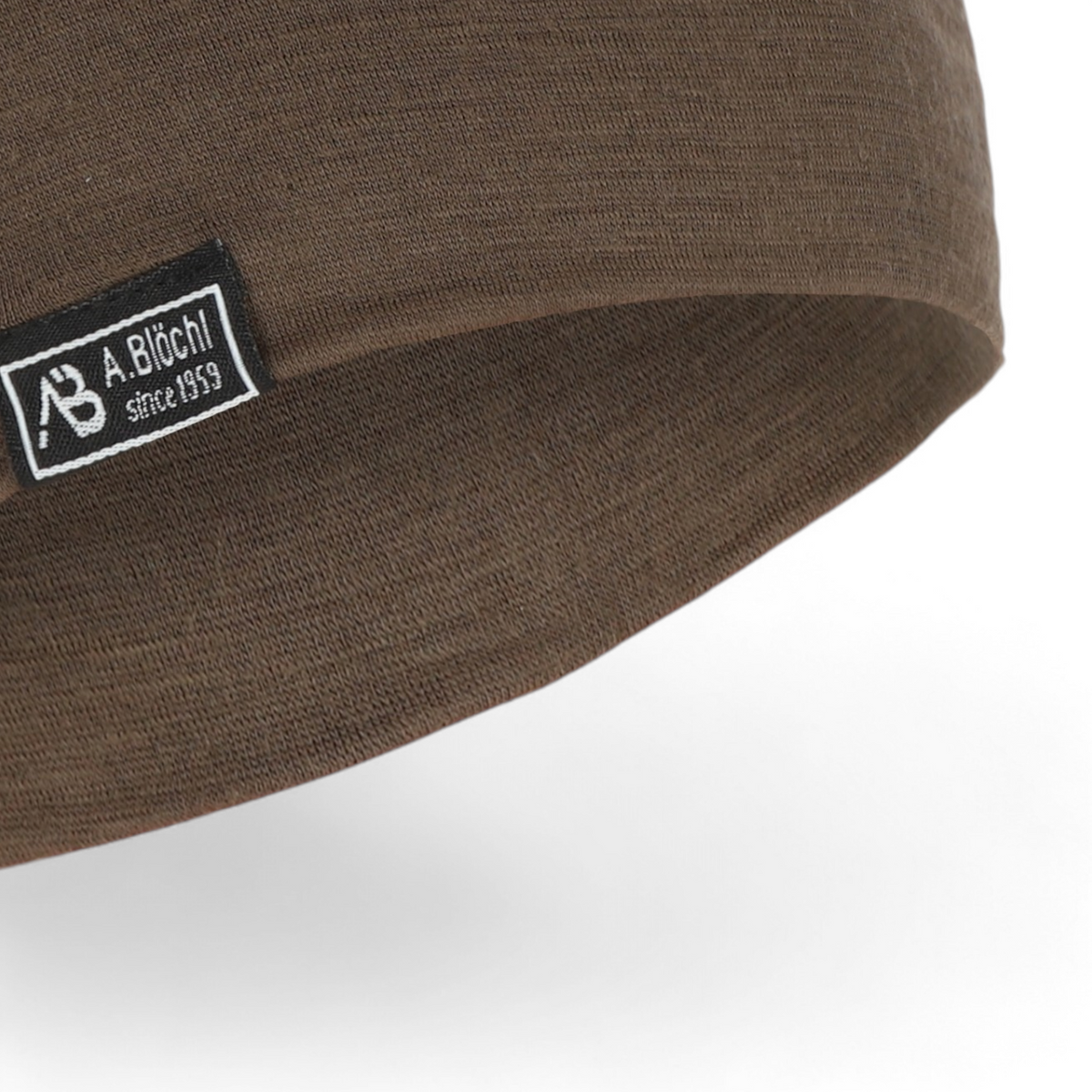 Adversary Force AB Beanie Lite Merino in brown, a lightweight single-layer merino wool hat with a small logo patch.