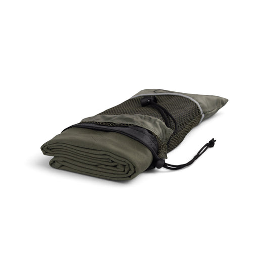 Adversary Force Snugpak Head to Toe olive green microfiber travel towel folded inside its mesh storage bag