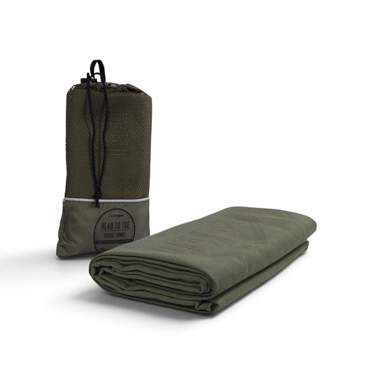 Adversary Force olive green Snugpak Head to Toe microfiber travel towel folded next to its mesh storage bag