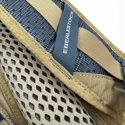 Adversary Force Eberlestock Switchblade backpack shoulder strap detail with mesh padding and branding label