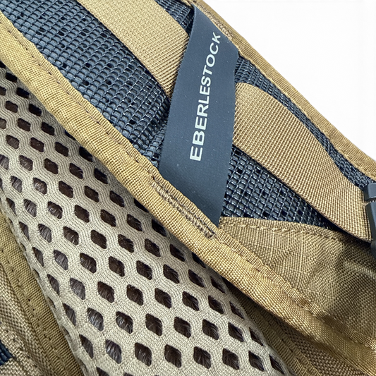 Adversary Force Eberlestock Switchblade backpack shoulder strap detail with mesh padding and branding label